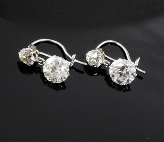 A pair of early-mid 20th century white gold? diamond drop earrings, 13mm.